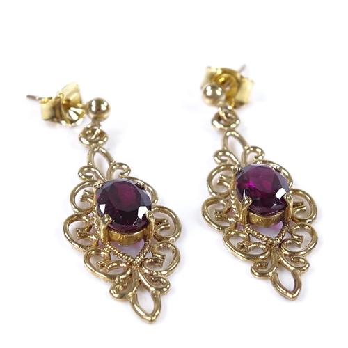 813 - A pair of 9ct gold garnet drop earrings, open wirework settings, height excluding fitting 29.2mm, 2.... 