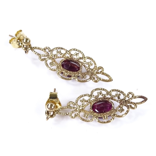 813 - A pair of 9ct gold garnet drop earrings, open wirework settings, height excluding fitting 29.2mm, 2.... 