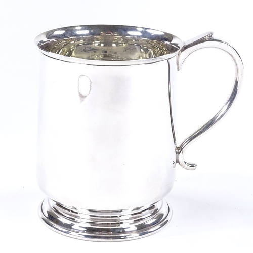 833 - A silver pint mug, of plain cylindrical form, by Cooper Brothers & Sons Ltd, hallmarks Sheffield 197... 