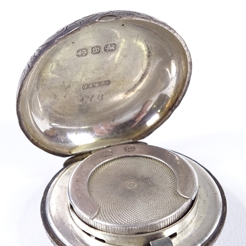 834 - A Victorian circular silver sovereign case, with allover engraved foliate decoration, by Cornelius D... 