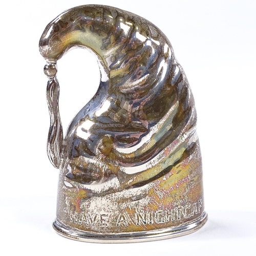 836 - An Edwardian novelty silver stirrup cup, modelled as a nightcap and engraved 