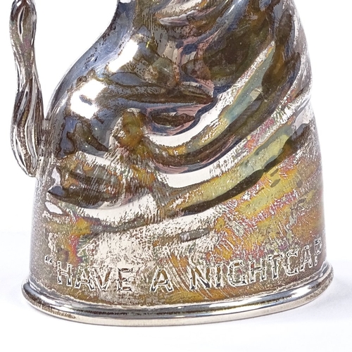 836 - An Edwardian novelty silver stirrup cup, modelled as a nightcap and engraved 