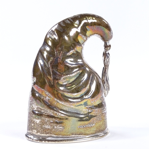 836 - An Edwardian novelty silver stirrup cup, modelled as a nightcap and engraved 