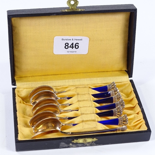 846 - A set of 7 Danish sterling silver-gilt and blue enamel coffee spoons, with crown terminals, by ELA, ... 