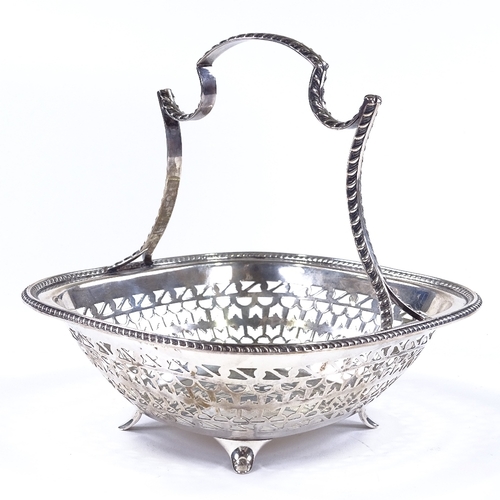 847 - A George V silver cake basket, with gadrooned rim and pierced border, indistinct maker's marks, hall... 