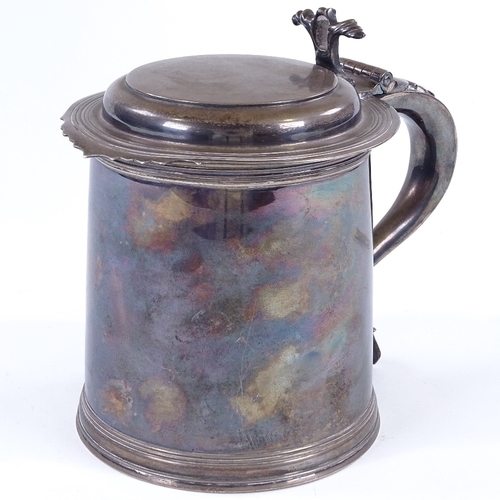 849 - A George V Britannia Standard silver lidded tankard, of plain cylindrical form with reeded foot, by ... 