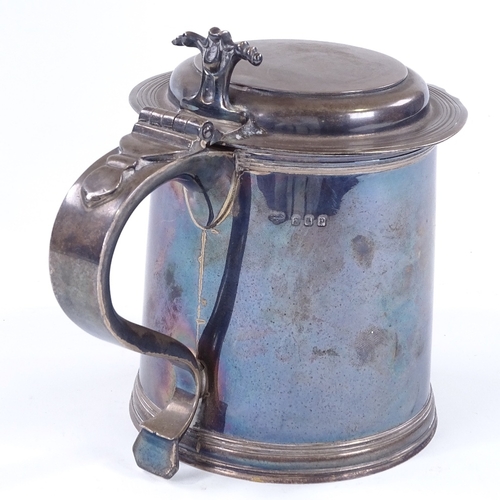 849 - A George V Britannia Standard silver lidded tankard, of plain cylindrical form with reeded foot, by ... 