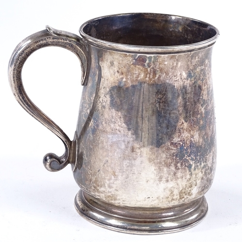 852 - A George II silver half pint mug, of tapered baluster form, by Francis Spilsbury I, hallmarks London... 