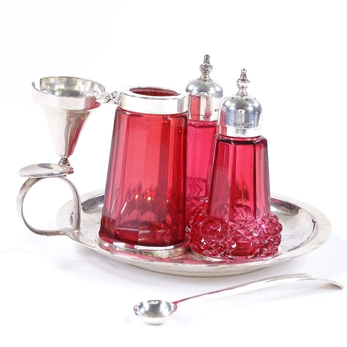 854 - A modern silver and cranberry glass cruet set, on silver fitted tray, maker's marks JW, hallmarks Bi... 