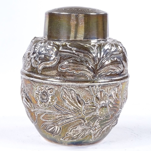 856 - An Edwardian silver baluster tea caddy, with relief embossed floral decoration, by Pairpoint Brother... 