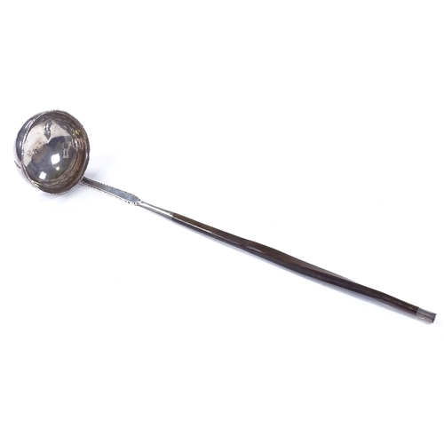 860 - A Georgian silver toddy ladle, with twisted whale bone handle, maker's marks WS, length 31cm