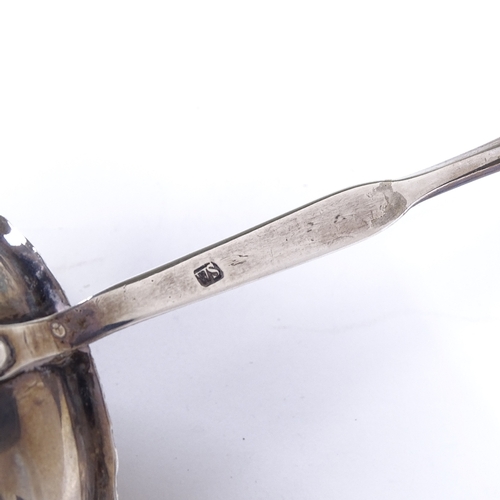 860 - A Georgian silver toddy ladle, with twisted whale bone handle, maker's marks WS, length 31cm