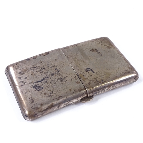 861 - An unusual large silver double-fronted cigarette case, of plain curved form, stamped silver, length ... 