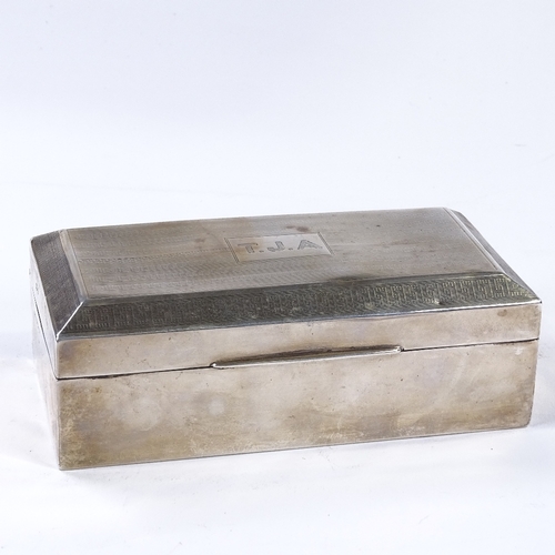 863 - A George V rectangular silver cigarette box, with engine turned lid, by F H Adams & Co, hallmarks Bi... 