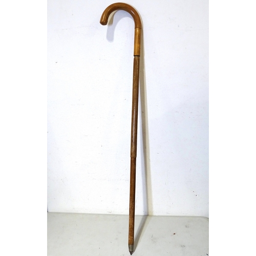 50 - A rare early 20th century Jaki tripod walking stick, the handle unscrewing to reveal a removable cam... 