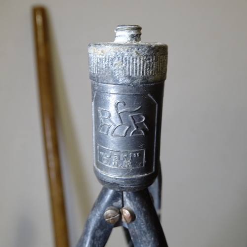 50 - A rare early 20th century Jaki tripod walking stick, the handle unscrewing to reveal a removable cam... 