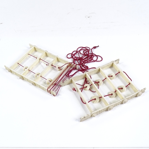 109 - 2 Chinese ivory puzzles with relief-carved sides, length 15cm