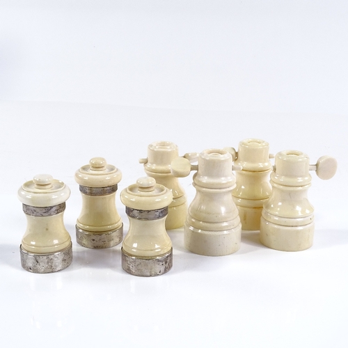 117 - 3 turned ivory pepper mills with ivory bands, height 7cm, and 4 ivory salt mills (7)