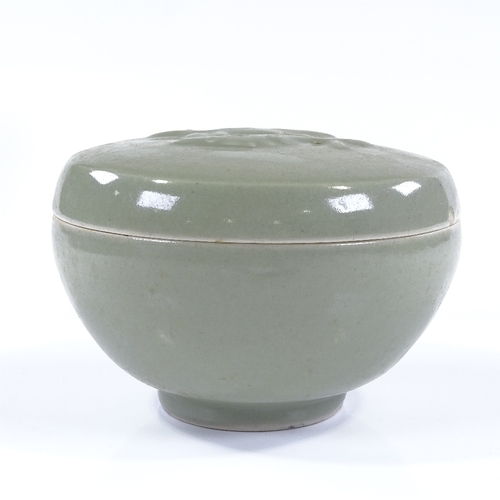 123 - A Chinese celadon glaze porcelain circular box and cover, diameter 17cm