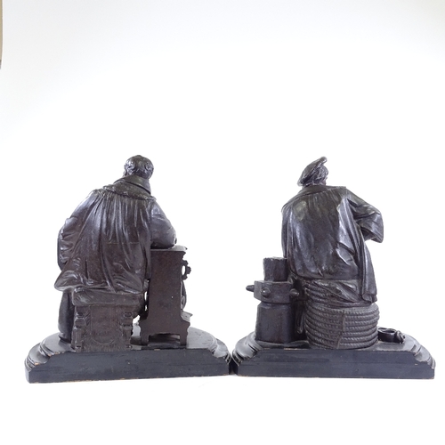 131 - A pair of 19th century patinated spelter figures of explorers on simulated marble wooden bases, heig... 