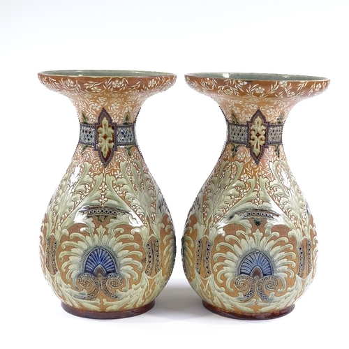 133 - Frank Butler for Doulton Lambeth, a pair of large stoneware vases with incised and painted decoratio... 