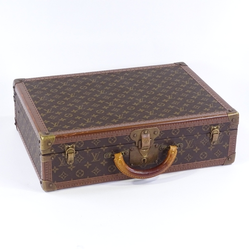 3 - A Vintage Louis Vuitton monogram suitcase, with brass fittings and original leather handle, 50cm x 3... 