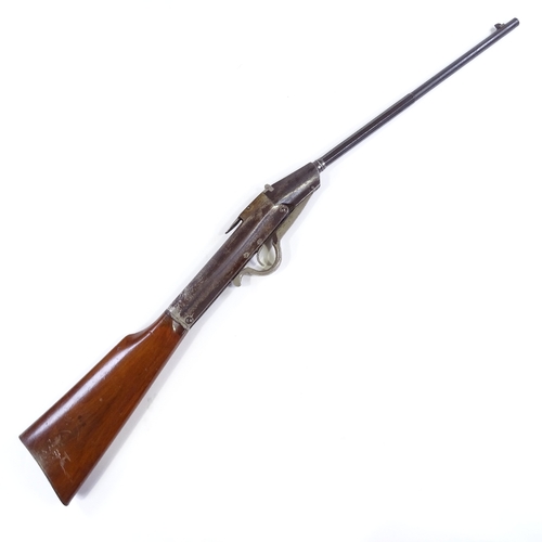32 - A Gem style air rifle, non standard calibre (circa 0.21), with break barrel and unusual long lever b... 