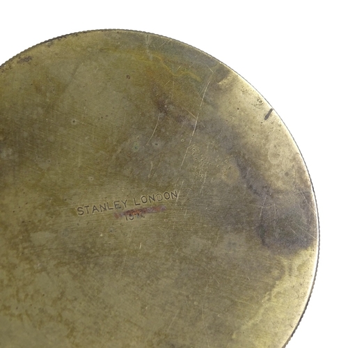 58 - A Stanley brass-cased surveyor's level, dated 1911, diameter 8cm