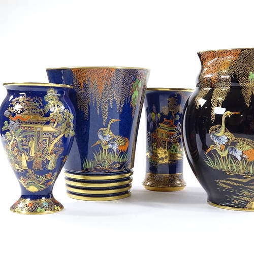 62 - 6 pieces of Carlton Ware Bleu Royale, including a large Heron design gilded jug, height 20cm (6)