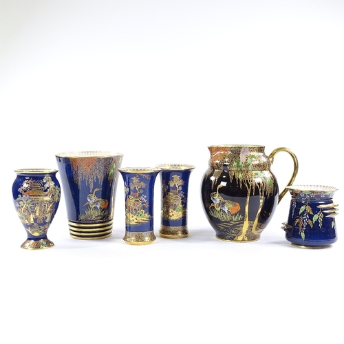 62 - 6 pieces of Carlton Ware Bleu Royale, including a large Heron design gilded jug, height 20cm (6)