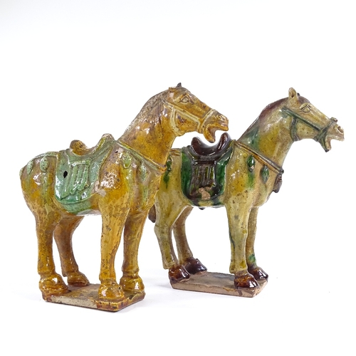 69 - A pair of Chinese Tang style green/brown glaze terracotta horses, height 20cm, in silk-lined boxes (... 