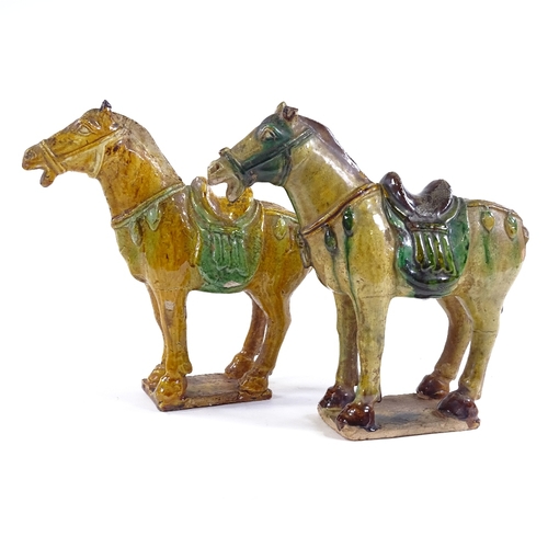 69 - A pair of Chinese Tang style green/brown glaze terracotta horses, height 20cm, in silk-lined boxes (... 