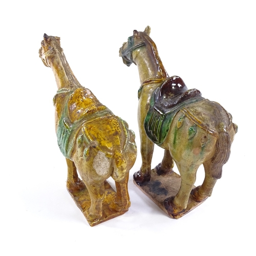 69 - A pair of Chinese Tang style green/brown glaze terracotta horses, height 20cm, in silk-lined boxes (... 