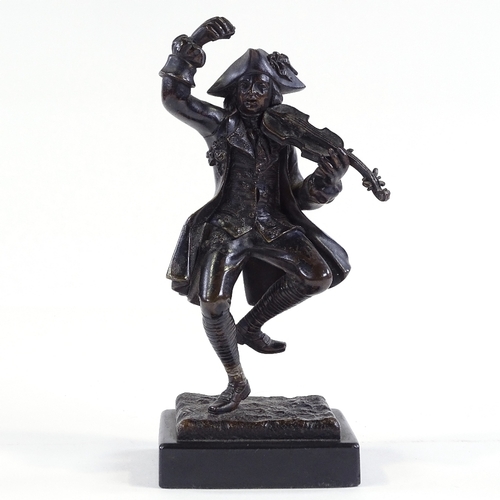 7 - A patinated bronze sculpture of a man playing a violin, black marble plinth, unsigned, height 20cm