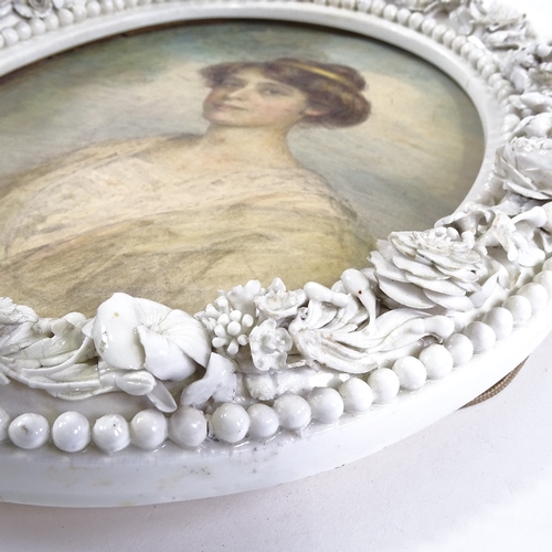 75 - Watercolour circa 1900, portrait of a lady in ornate floral encrusted white glaze porcelain frame, o... 