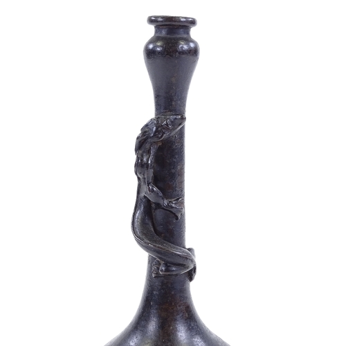 76 - A 19th century Chinese patinated bronze narrow-necked vase with dragon-mounted neck, original label ... 