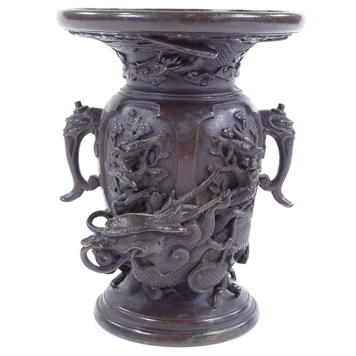 82 - A Japanese patinated bronze vase with cast dragon entwined body, signed under base, height 13.5cm