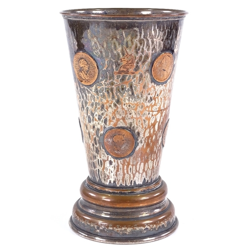 83 - An unusual silver plate on copper gaming cup, with inset coins and dice behind glass panel under the... 