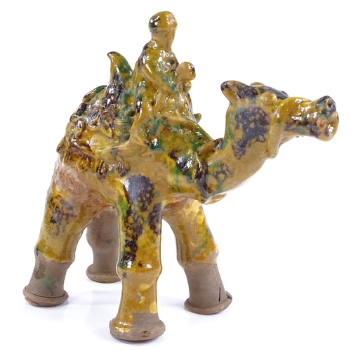 85 - A Turkish Canakkale yellow glaze pottery camel and rider, height 19cm