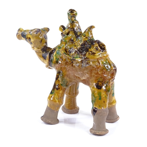 85 - A Turkish Canakkale yellow glaze pottery camel and rider, height 19cm