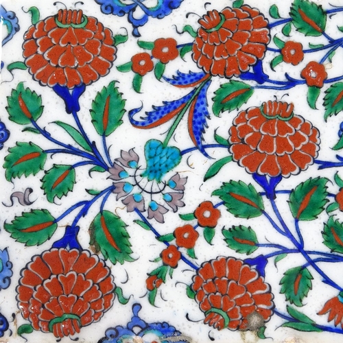 88 - A Turkish painted pottery tile, 16cm x 24cm