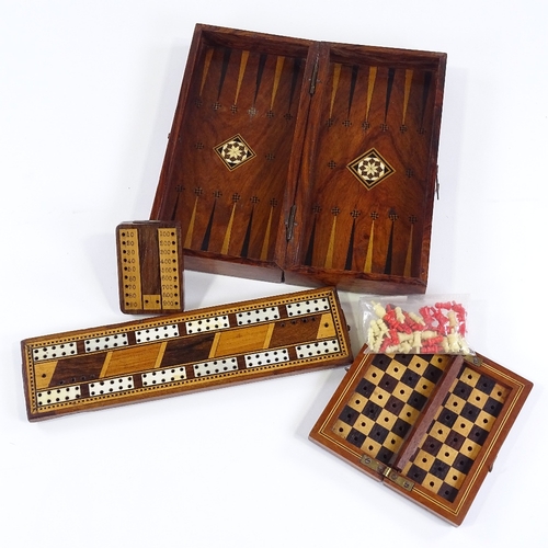 139 - A group of Victorian games boxes and cribbage markers