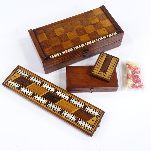 139 - A group of Victorian games boxes and cribbage markers