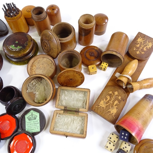 140 - A group of Victorian treen boxes, a leather shot flask etc