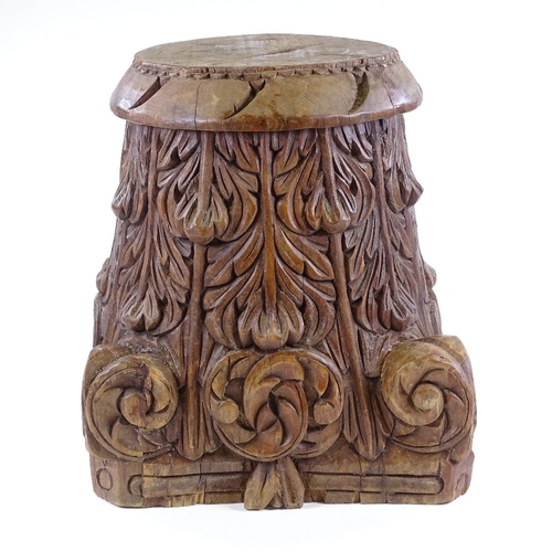 142 - A large ornamental carved hardwood column capitol, height 46cm, width 40cm