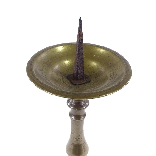 148 - A 17th century bronze pricket candle stand, height overall 44cm