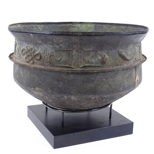 162 - A large Chinese Han-Viet archaic bronze bowl with relief cast frieze, diameter 39cm, on modern stand