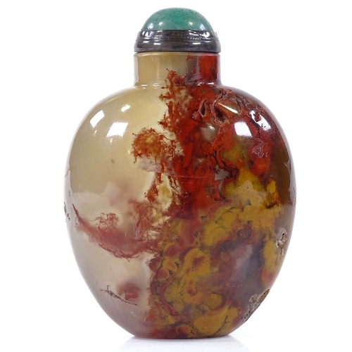 191 - An Antique Chinese plume agate snuff bottle, with opaque oxide deposits, original jade-mounted stopp... 