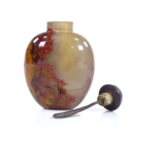 191 - An Antique Chinese plume agate snuff bottle, with opaque oxide deposits, original jade-mounted stopp... 