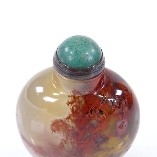 191 - An Antique Chinese plume agate snuff bottle, with opaque oxide deposits, original jade-mounted stopp... 